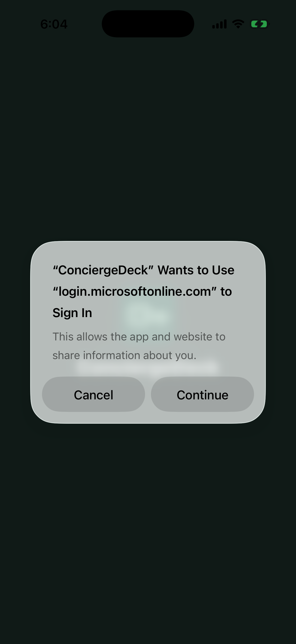 iPhone prompt: ConciergeDeck wants to use login.microsoftonline.com to sign in, with Cancel and Continue