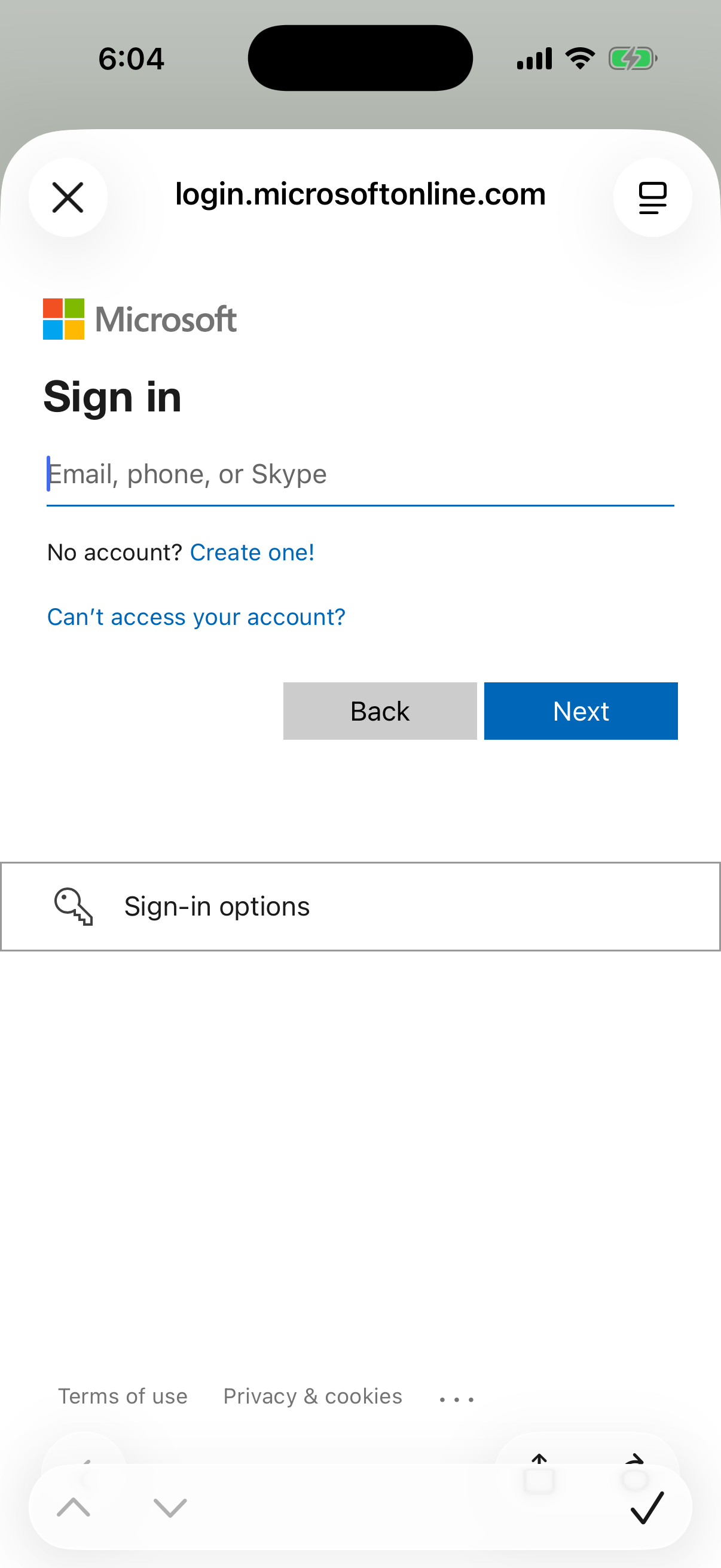 Microsoft Sign in page on login.microsoftonline.com inside the app, with the Email, phone, or Skype field